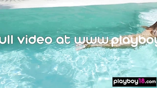 Slender Australian nude blondie swimming