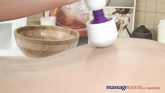 In massage rooms, a teen experiences a magic wand orgasm for the first time