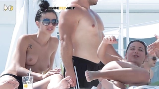 Young nudist showing her perfect natural breasts