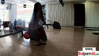 Amateur Thai teen Noom feeding her pussy