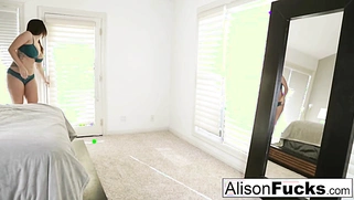 Alison Tyler, a six-foot hottie, stuffs a toy into her pussy.