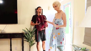 Busty Short-Haired Blonde MILF Gives Oral and Rides Dark-Skinned Stud Passionately