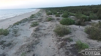 Blonde Beach Orgasm at Sunset