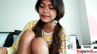 Excited Thai teen gets a big white cock
