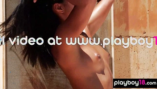 Latina teen poses nude under the hot sun