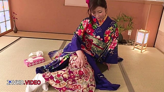 Sultry JAV Star in Kimono Gives Passionate Blowjob During Cam Show