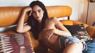 Teen undressing to the music and dancing