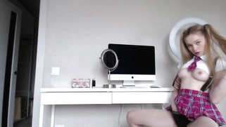 Innocent looking teen takes big dildo in her ass