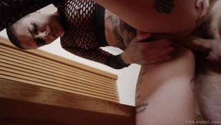 Goth beauty Leigh Raven leaned on the table and got pounded