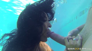 Holly Halston sucks and titfucks meaty dick underwater