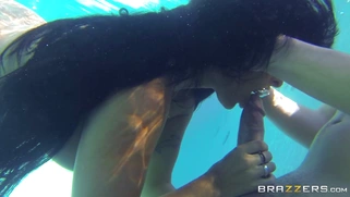 Holly Halston sucks and titfucks meaty dick underwater