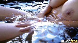 Busty Bridgette B takes a sexy bath and masturbates