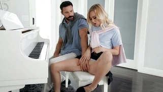 Kenzie Kai takes piano lessons from Charles Dera