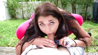 April Dawn gives nice blowjob in POV outdoors