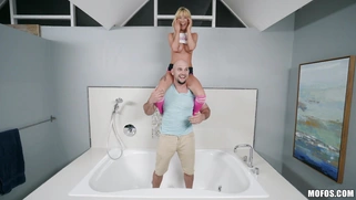 Kenzie Reeves has fun with Jmac in the bathtub