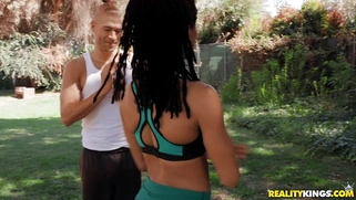 Kira Noir sucks cock and licks balls in the park